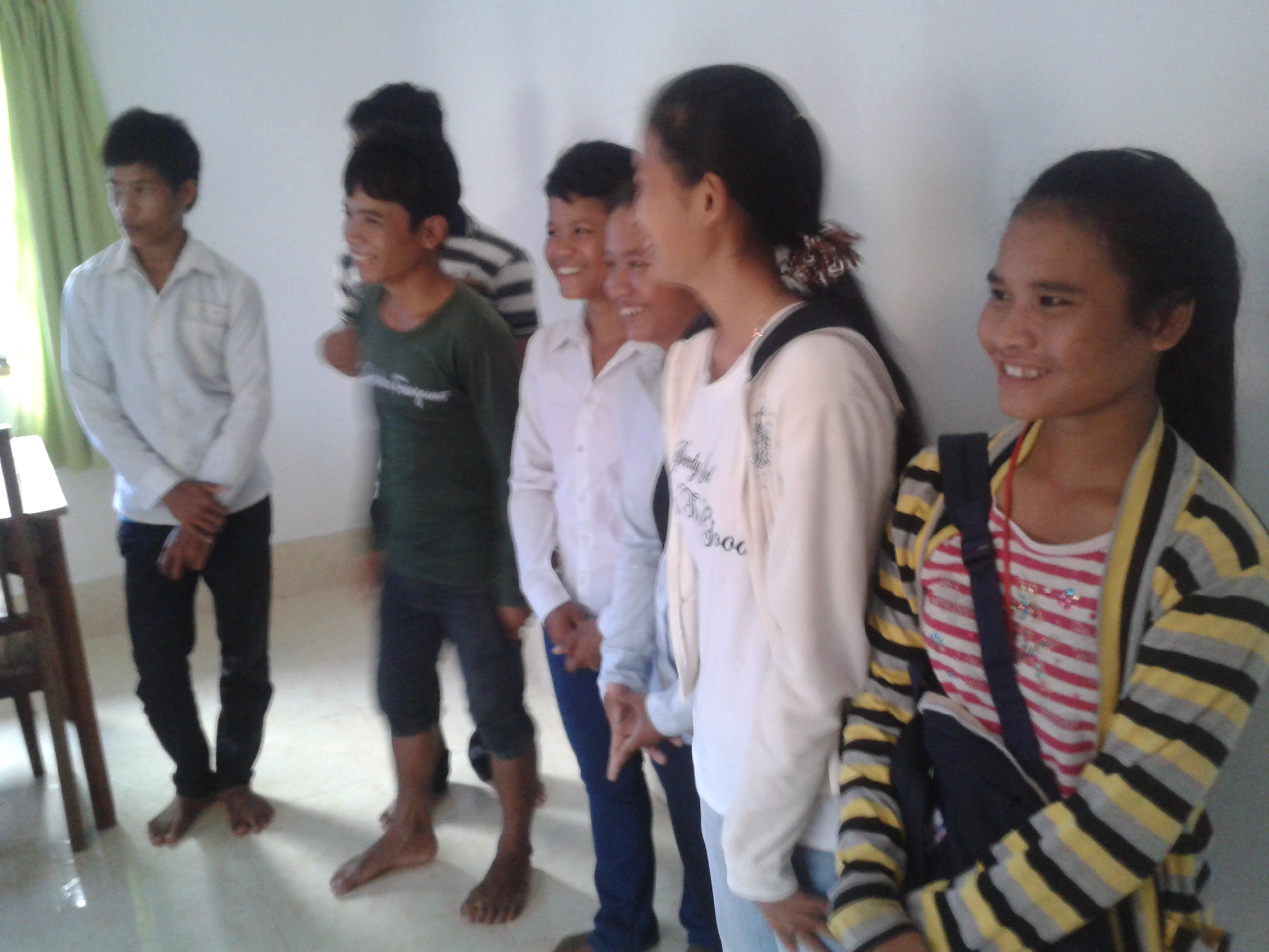 Sreymao with her new student peers at their new house in Siem Reap.