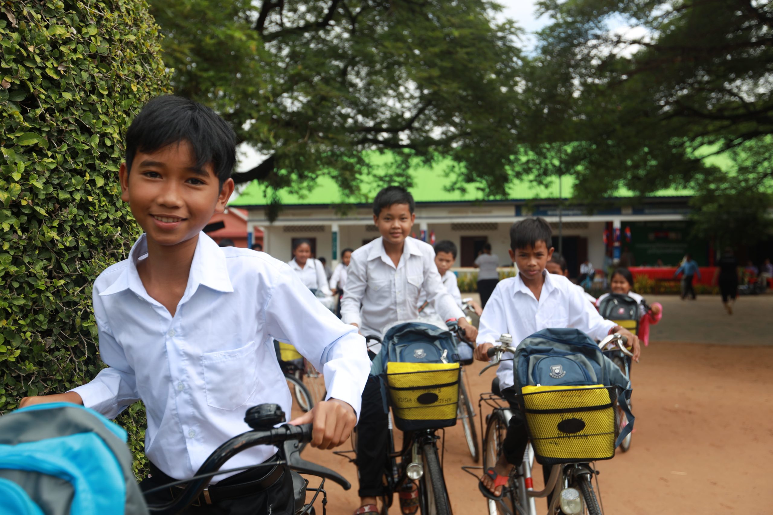 Tchey boys cycling out of school